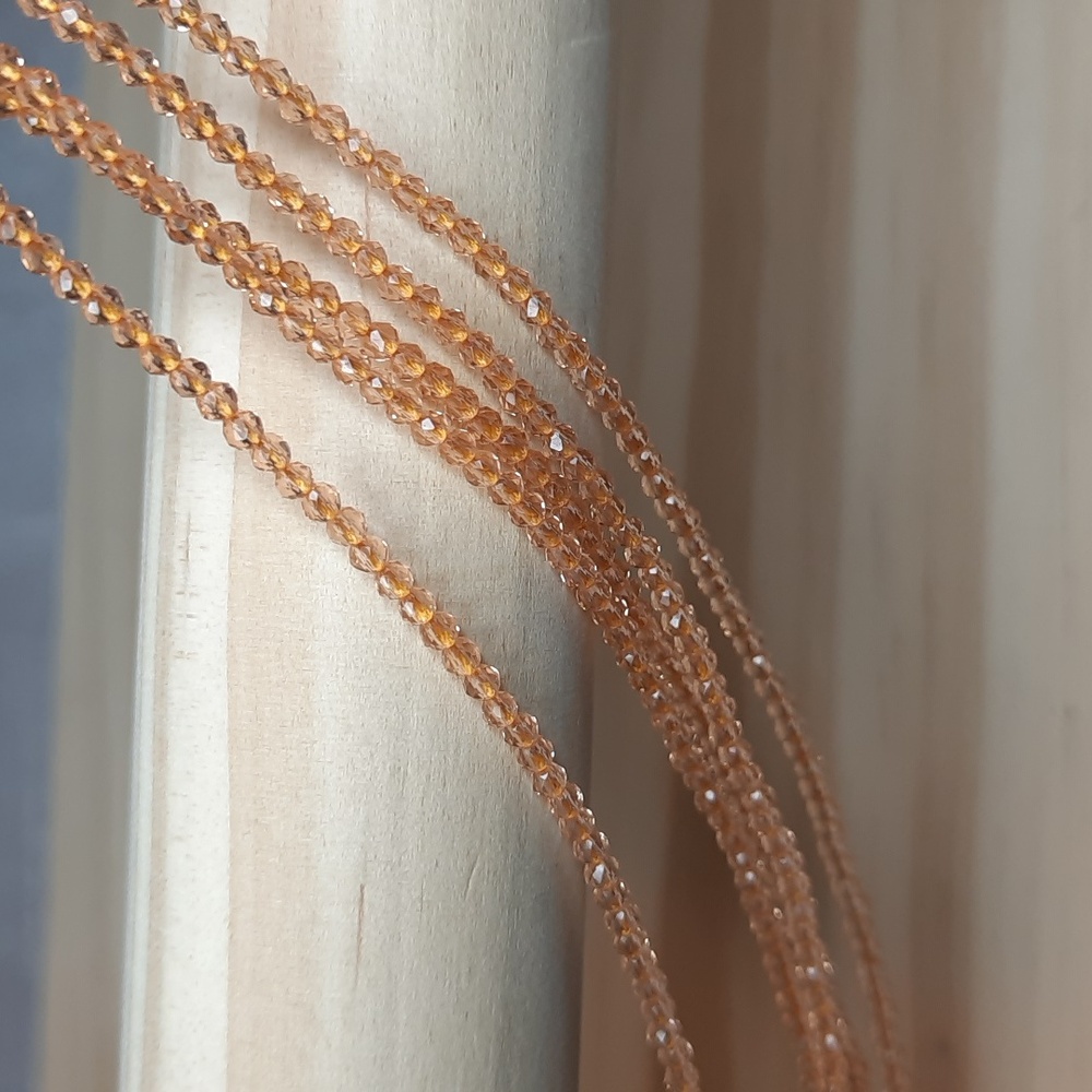 2mm Champagne Chinese Faceted Hydro Crystal 14in Strands